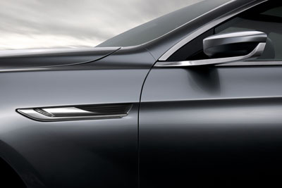 Close up of a driver side door panel of a sleek,new car